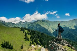 Hiker looking over mountain scene.