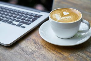 coffee cup and laptop